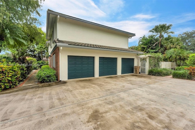 view of home's exterior with a garage