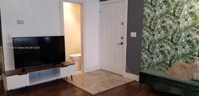 living room featuring dark hardwood / wood-style flooring