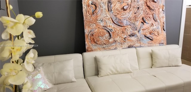 sitting room featuring dark wood-type flooring