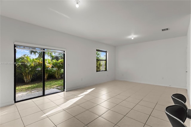 view of tiled spare room