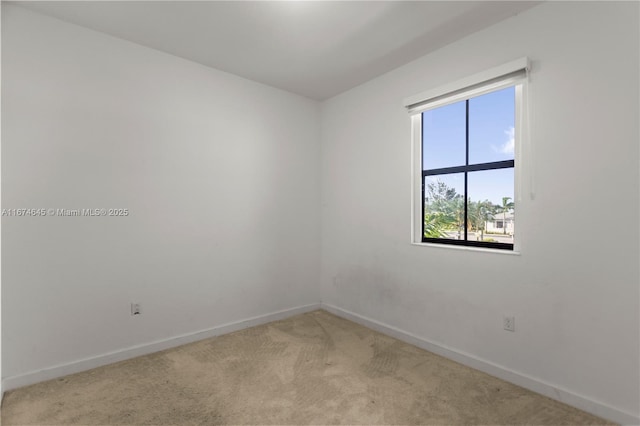 view of carpeted spare room