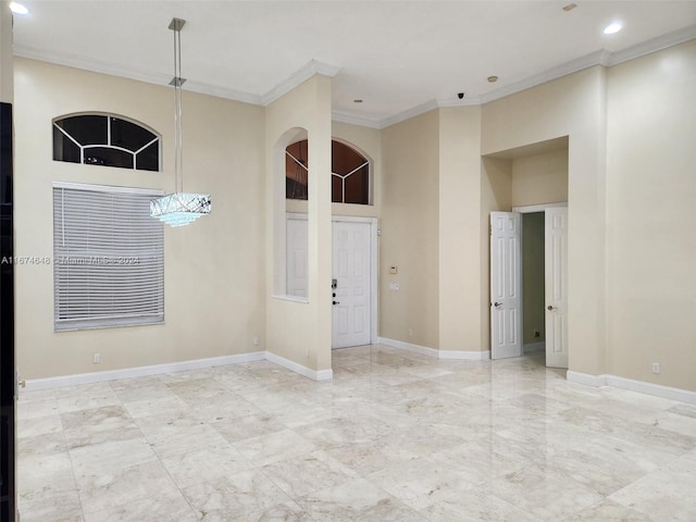 321 Windmill Palm Ave, Plantation, FL 33324 - empty room featuring crown molding, arched walkways, a high ceiling, recessed lighting, and marble finish floors