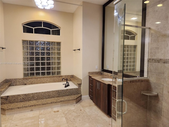 bathroom with vanity and plus walk in shower