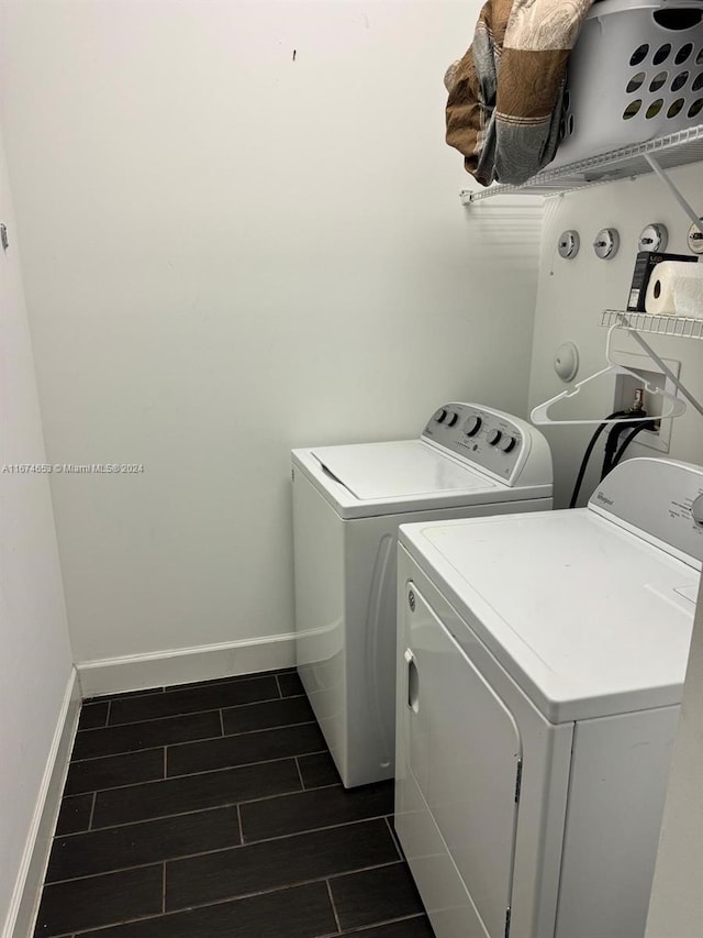 laundry room with independent washer and dryer