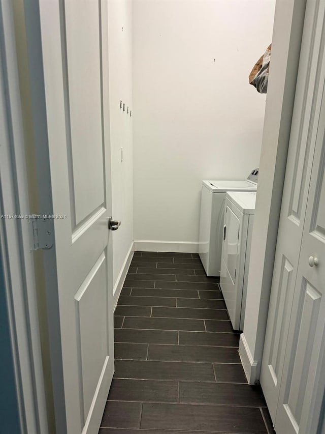 laundry room with separate washer and dryer