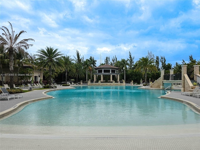 view of swimming pool featuring a patio