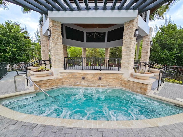 view of pool with ceiling fan