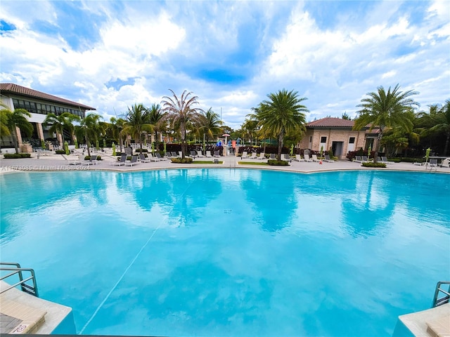 view of swimming pool featuring a patio