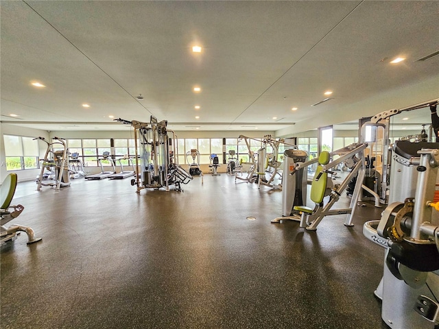 gym featuring a textured ceiling