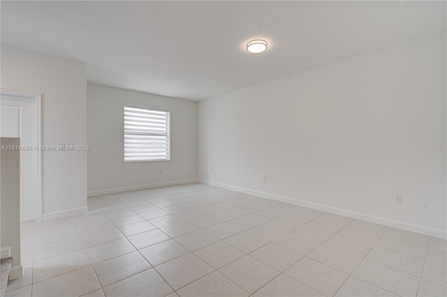 view of tiled spare room