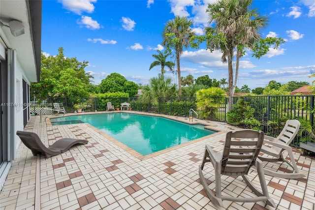 view of pool featuring a patio