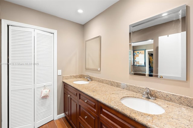 bathroom featuring vanity and hardwood / wood-style flooring