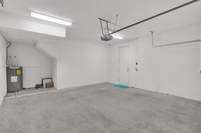 garage featuring a garage door opener and water heater