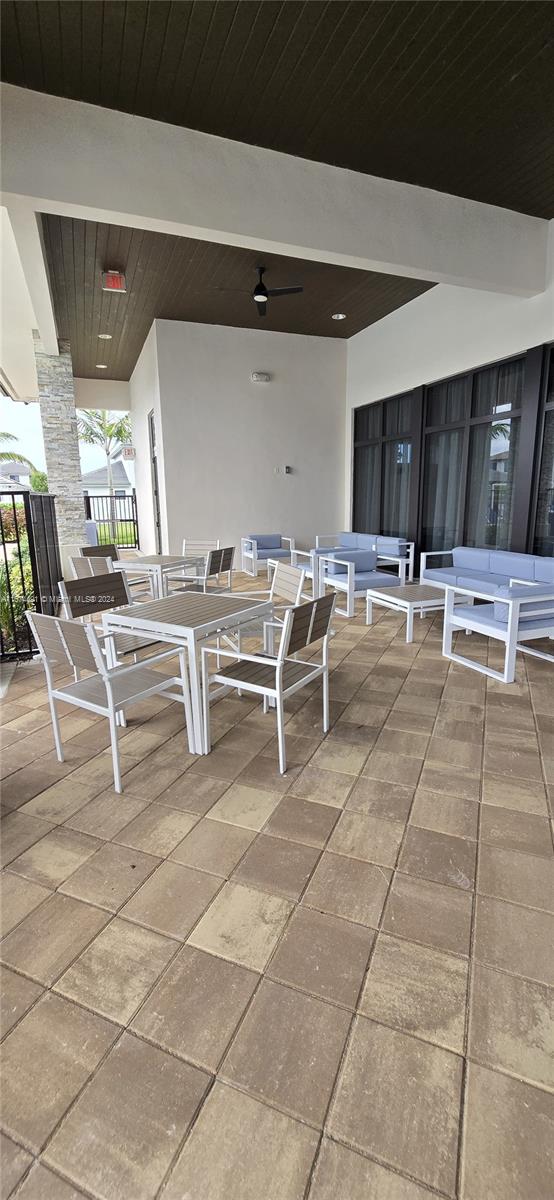 view of patio with ceiling fan