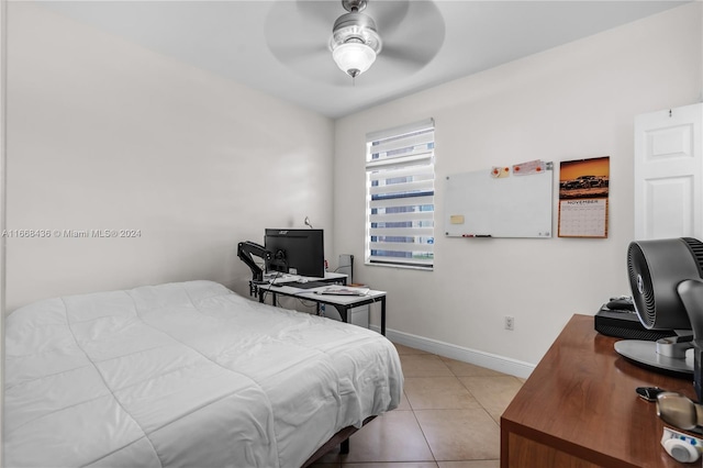 bedroom featuring light tile patterned flooring and ceiling fan