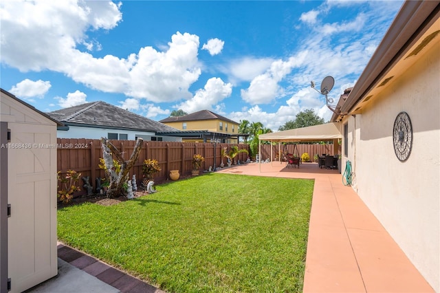 view of yard with a patio area