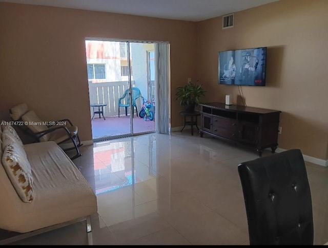 living room with light tile patterned floors