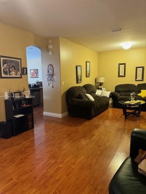 living room featuring hardwood / wood-style flooring