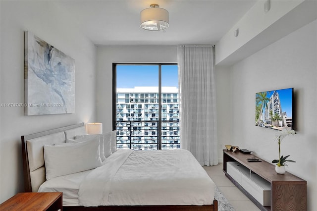 bedroom with light tile patterned flooring