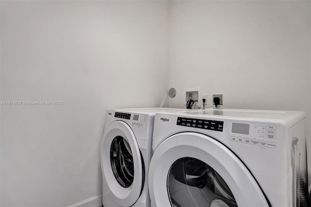 laundry room with washer and dryer