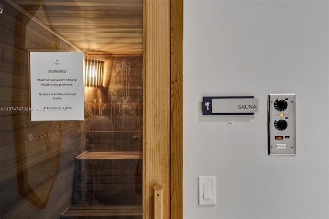 view of sauna / steam room featuring wooden ceiling