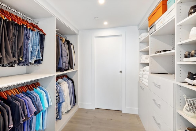 walk in closet featuring light wood-type flooring