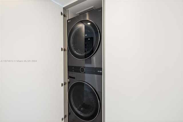 650 W Ave Unit 1101, Miami Beach, FL 33139 - laundry area featuring stacked washing machine and dryer
