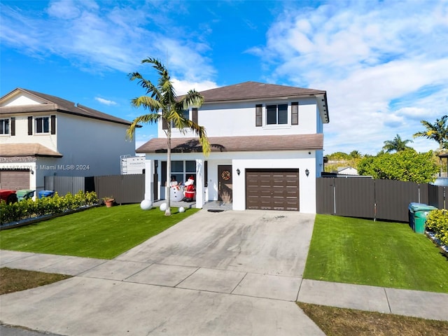 front facade featuring a front lawn and a garage