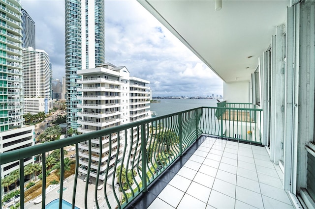 balcony featuring a water view