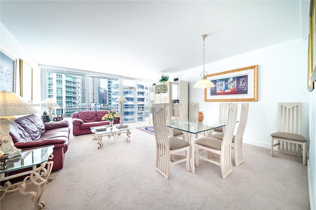 dining room featuring carpet