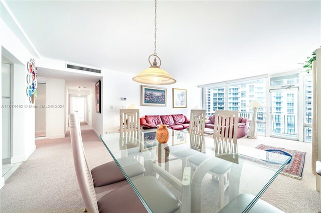 1408 Brickell Bay Dr Unit 1415 & 1416, Miami, FL 33131 - dining area with light carpet and baseboards