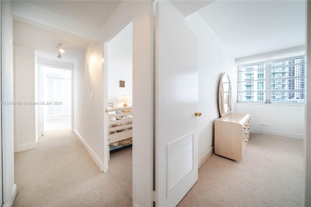 1408 Brickell Bay Dr Unit 1415 & 1416, Miami, FL 33131 - hallway featuring light carpet and baseboards
