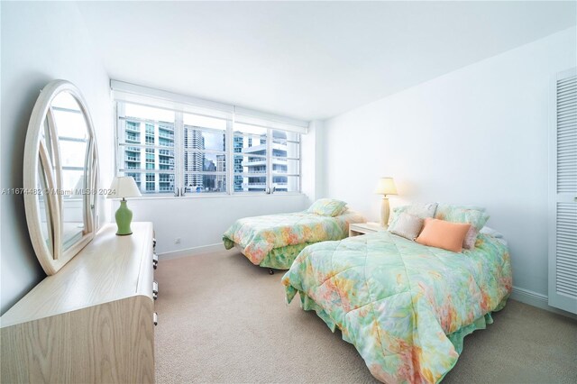 1408 Brickell Bay Dr Unit 1415 & 1416, Miami, FL 33131 - bedroom with carpet and baseboards