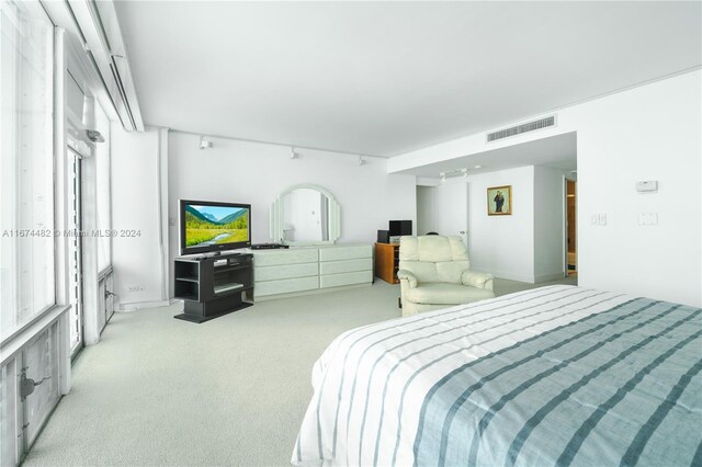 1408 Brickell Bay Dr Unit 1415 & 1416, Miami, FL 33131 - bedroom with light carpet