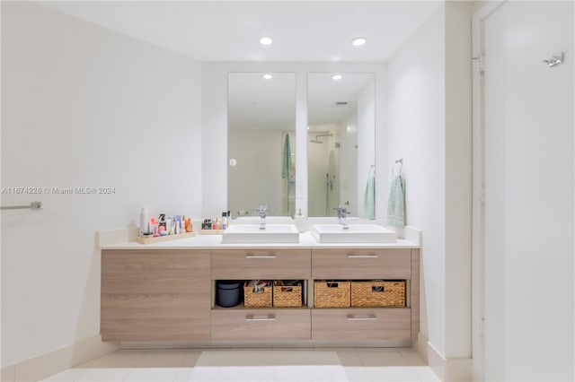 bathroom featuring tile patterned floors and vanity