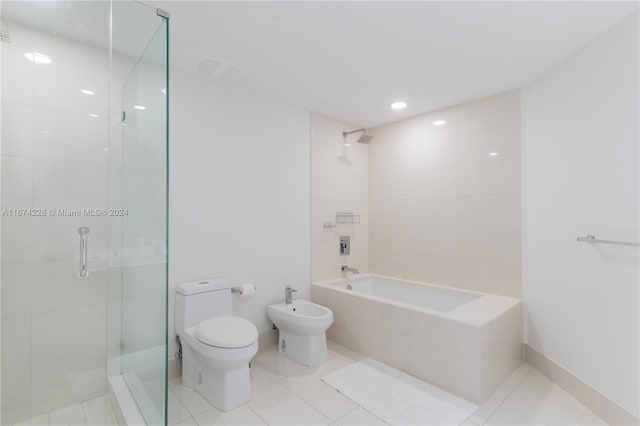 bathroom featuring independent shower and bath, a bidet, toilet, and tile patterned floors