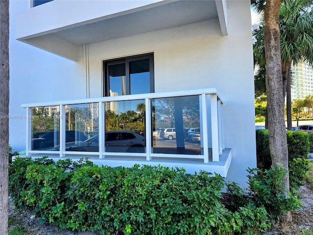 view of side of home featuring stucco siding