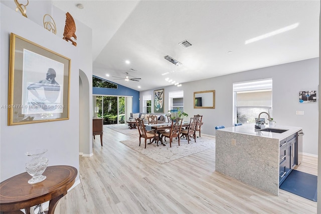 11088 Indian Lake Cir, Boynton Beach, FL 33437 - dining space featuring vaulted ceiling, light wood-type flooring, and a ceiling fan