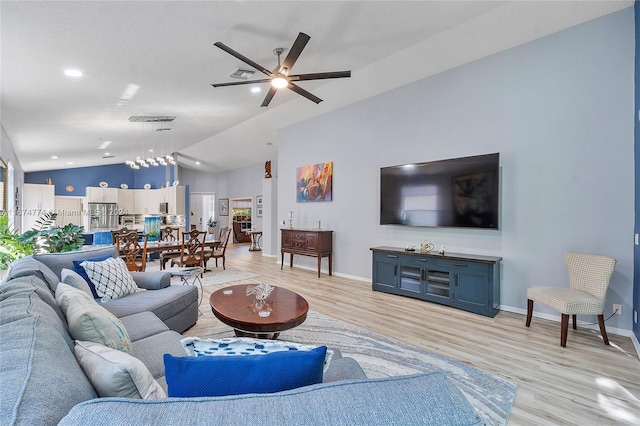11088 Indian Lake Cir, Boynton Beach, FL 33437 - living area featuring vaulted ceiling, light wood-type flooring, ceiling fan, and recessed lighting