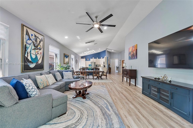 11088 Indian Lake Cir, Boynton Beach, FL 33437 - living area featuring light wood-style flooring, lofted ceiling, and ceiling fan