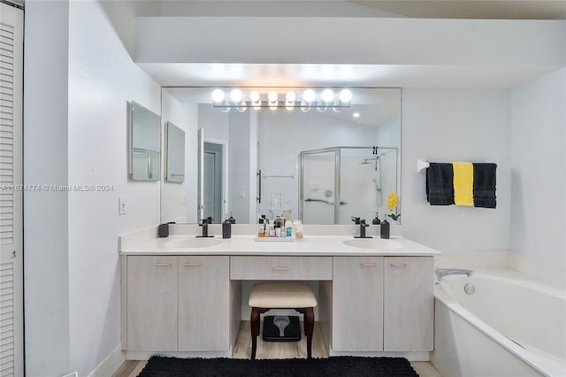 11088 Indian Lake Cir, Boynton Beach, FL 33437 - full bathroom featuring a closet, a stall shower, double vanity, and a garden tub