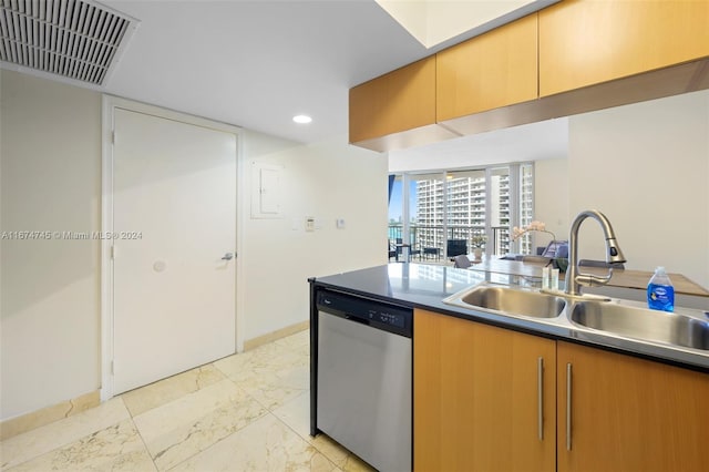 kitchen featuring dishwasher and sink