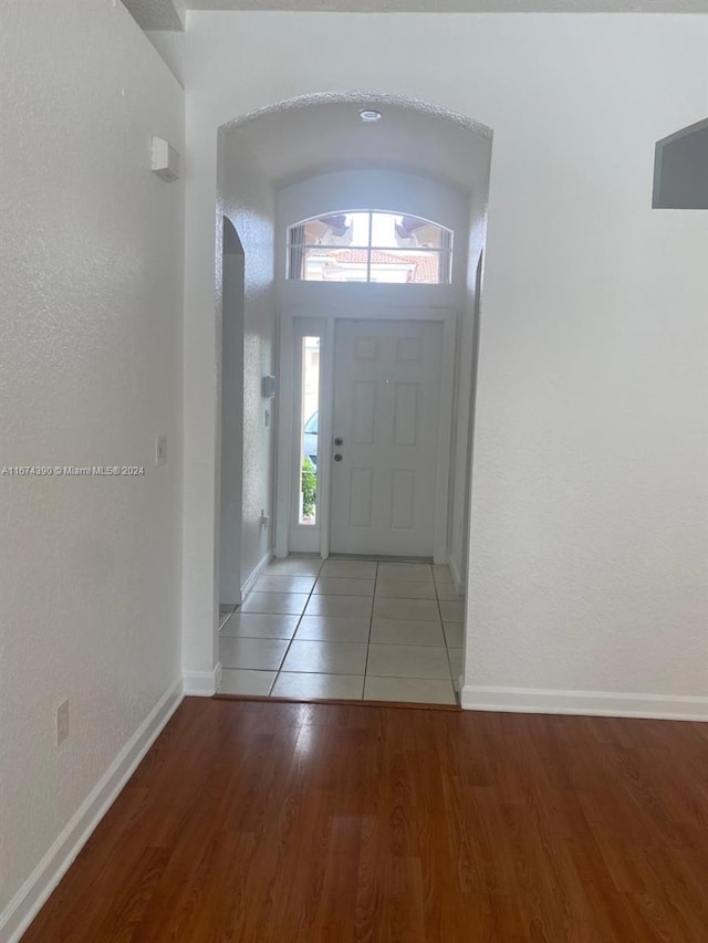 foyer with hardwood / wood-style flooring