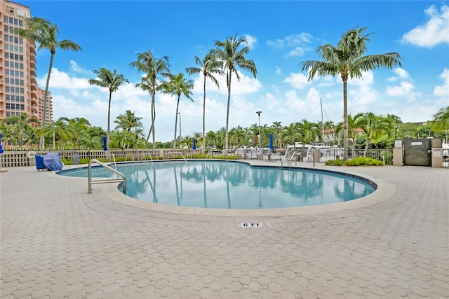 view of swimming pool with a patio