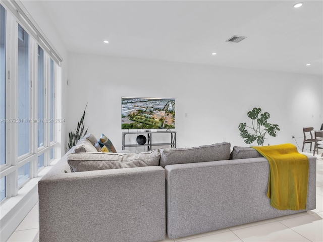 living room with light tile patterned floors