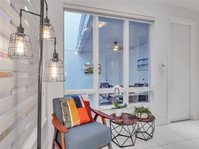 sitting room featuring light tile patterned flooring