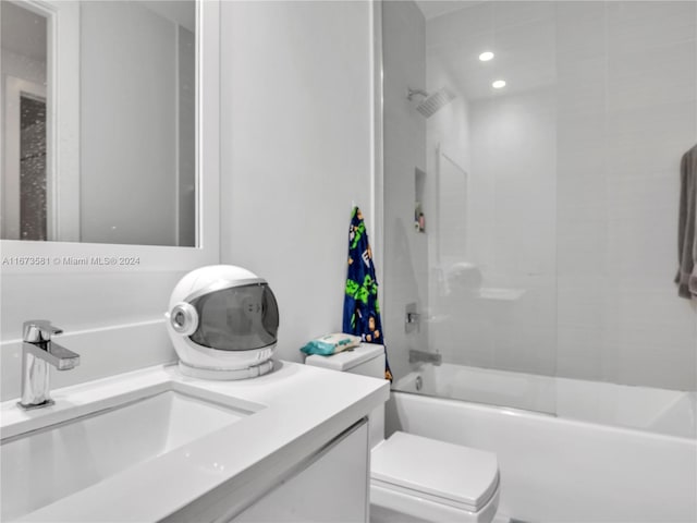 full bathroom with vanity, shower / bathtub combination, and toilet