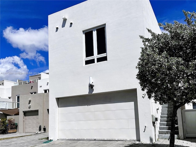 view of home's exterior featuring a garage