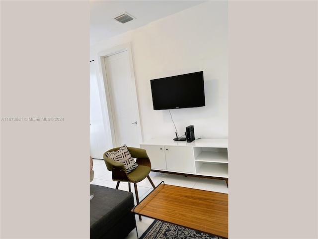 living room featuring light tile patterned floors