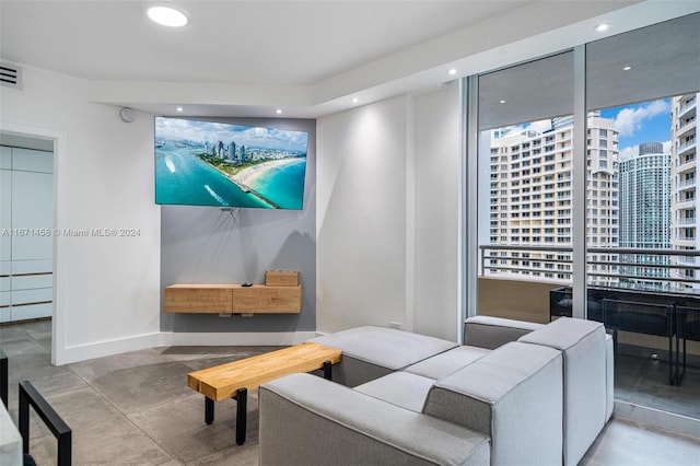 living room featuring concrete floors